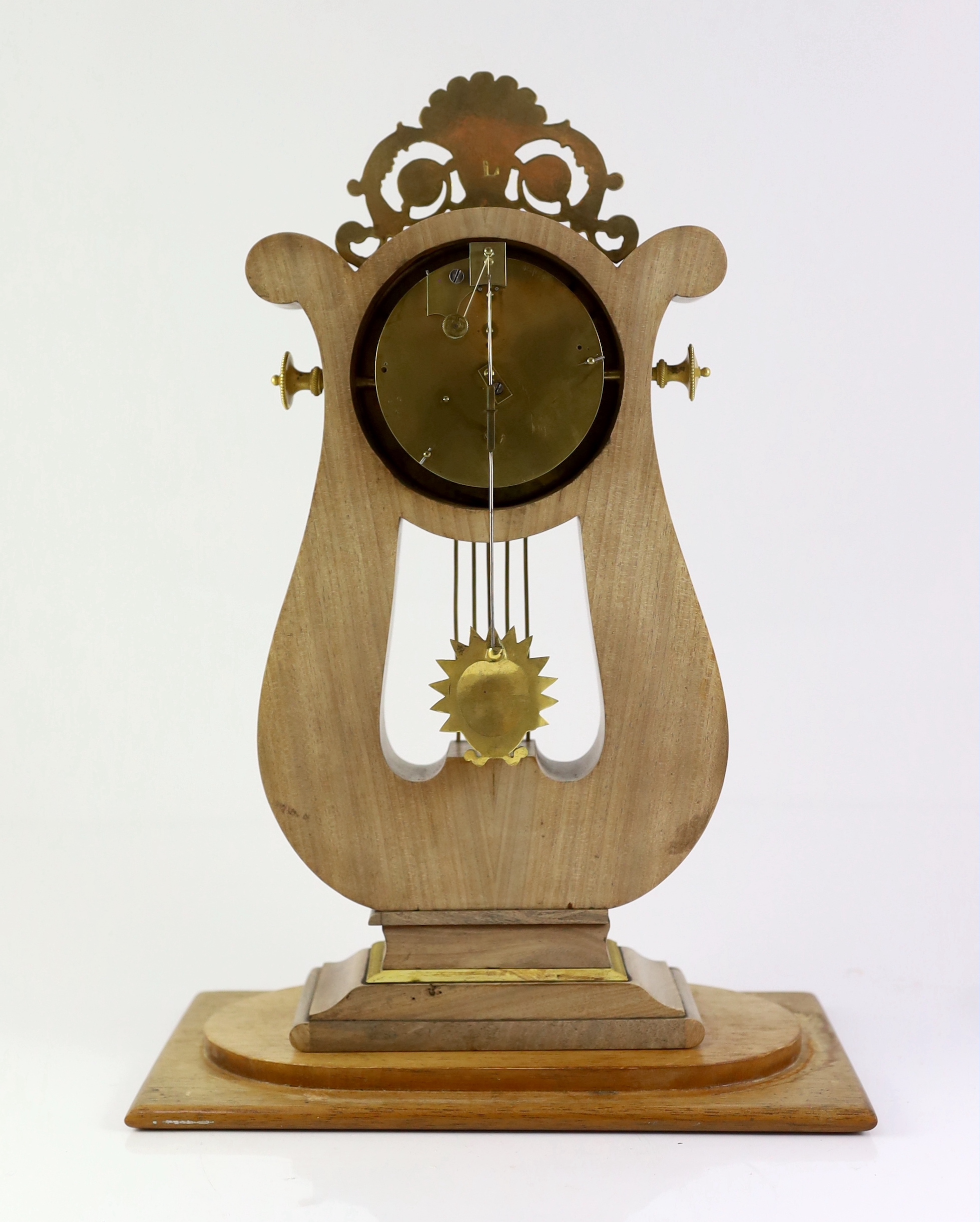 Bautte et Moynier, an early 19th century Swiss ormolu mounted mahogany lyre shaped mantel timepiece